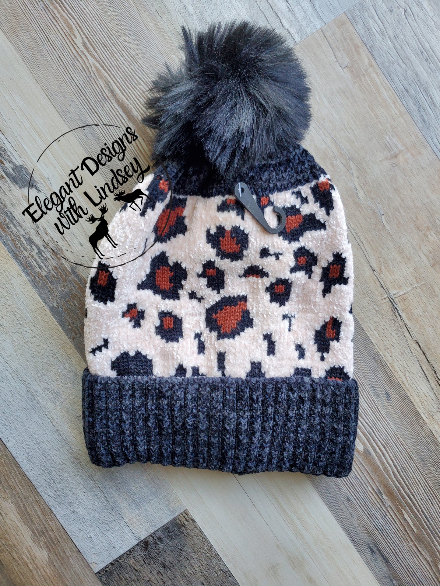 Black Leopard print winters hat with pom