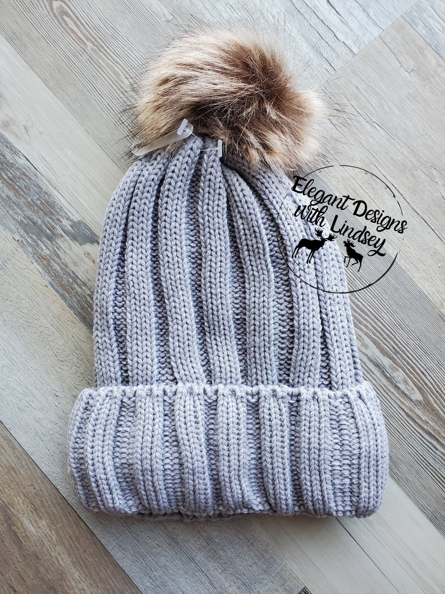 Gray winters hat with pom