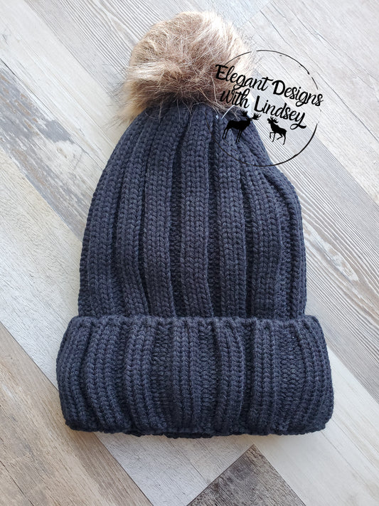 Black winters hat with pom