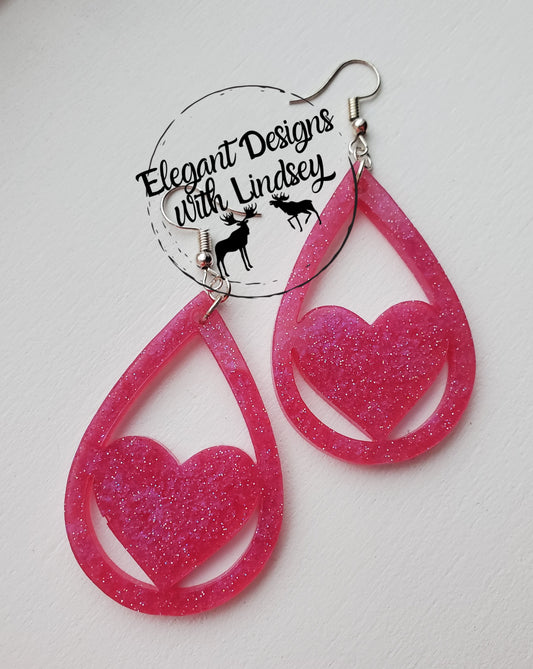 Pink glitter heart resin earrings